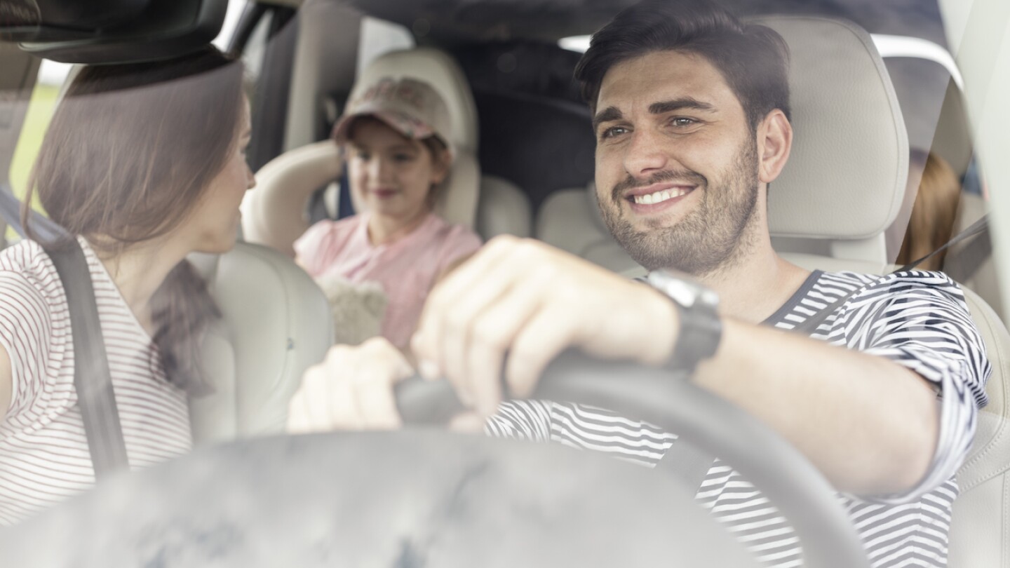 Happy family doing a road trip